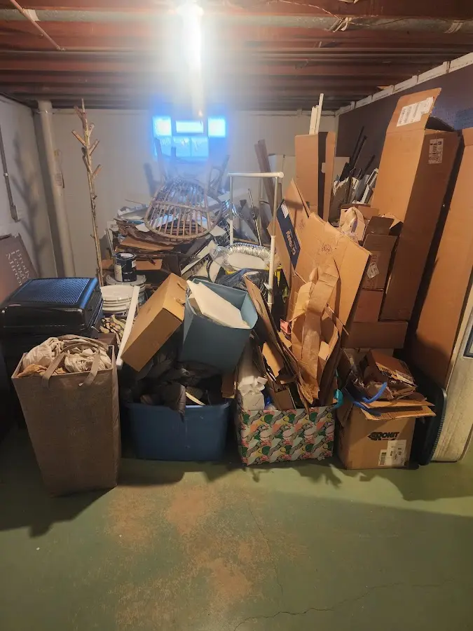 Roll-off dumpster container at job site for 4 Yard Dumpster Rental in Chartiers